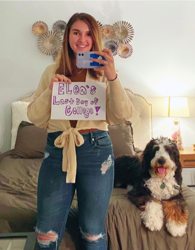 A woman taking a selfie with her dog.